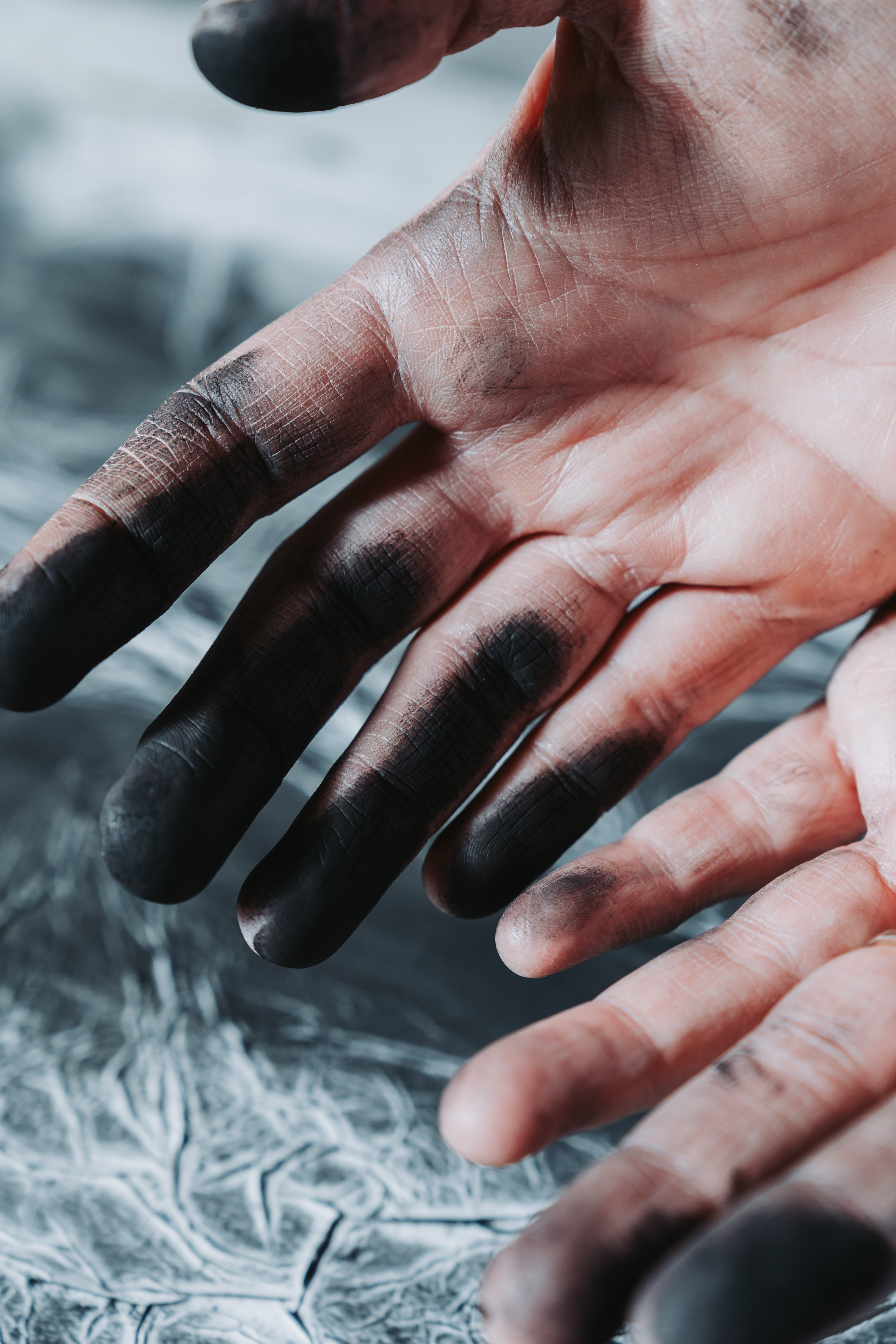 Ink-stained hands